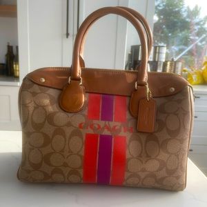 Coach mid size handbag. Classic coach design with a spring color accent.